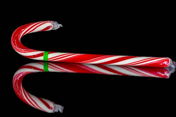 Christmas candy cane with green stripe — Stock Photo, Image