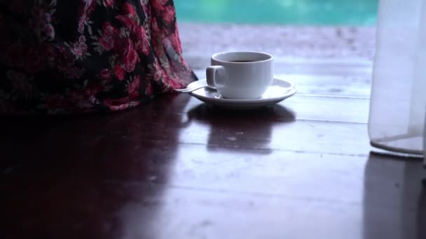 Morning coffee at the terrace in front of the pool. Vacation mode ON. — Stock Video