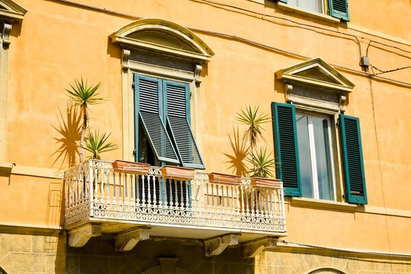 Exterior of vintage flats, traditional living city centers of Italian cities