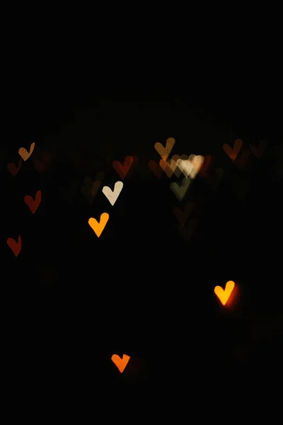 Boken corazones coloridos de las luces de la ciudad de la noche —  Fotos de Stock