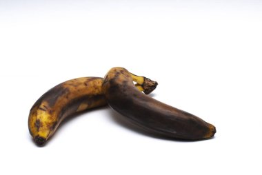 2 tane olgun muz ve arka plan.