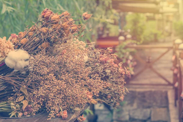 Bouquet of dried flowers and roses with leaves — Stock Photo, Image