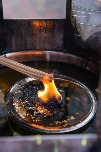 Burning red incense sticks in temple at Thailand — Stock Photo, Image