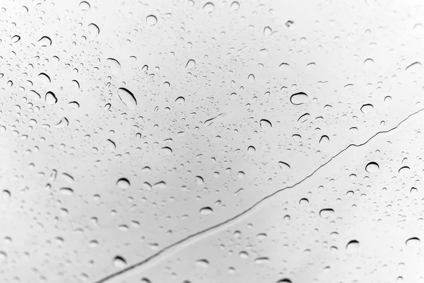 Gocce d'acqua su vetro dopo pioggia per sfondo — Foto Stock
