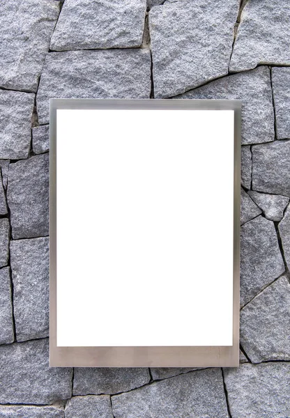 blank of aluminum photo frame or empty poster billboard on stone