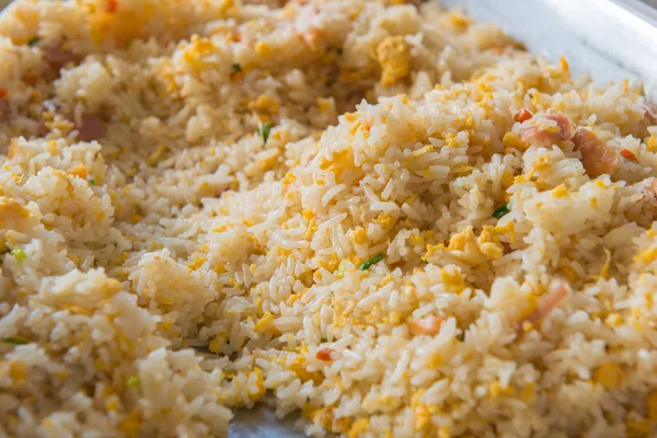 Pork fried rice on wood table in the morning — Stock Photo, Image