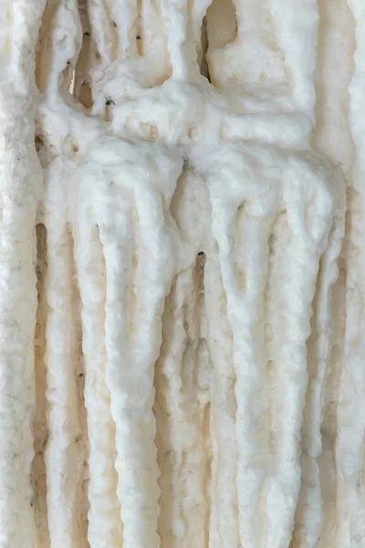 Текстурный камень из натуральных или сталактитов абстрактный для дизайна — стоковое фото