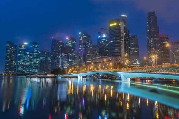 Singapore landmark city skyline at the Marina bay during twilight.