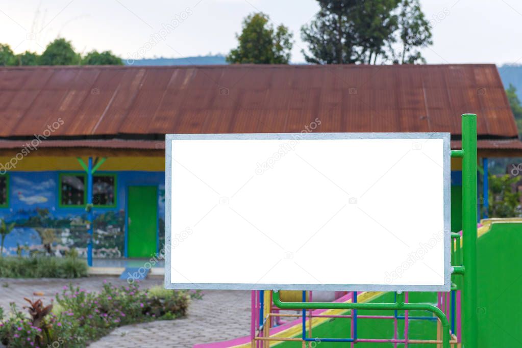 blank billboard in green park field at city park zone