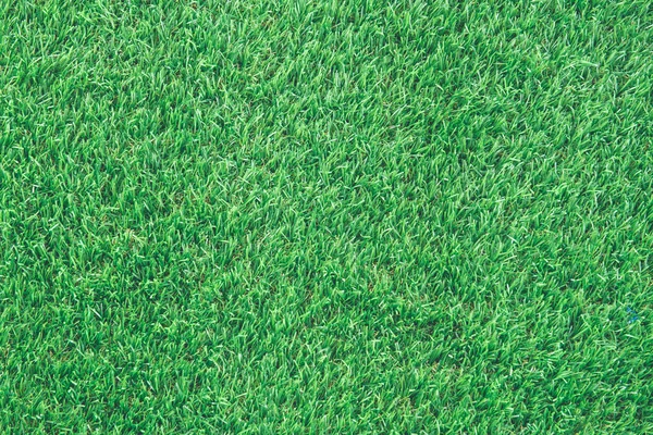 Искусственная зеленая трава текстуры для фона — стоковое фото
