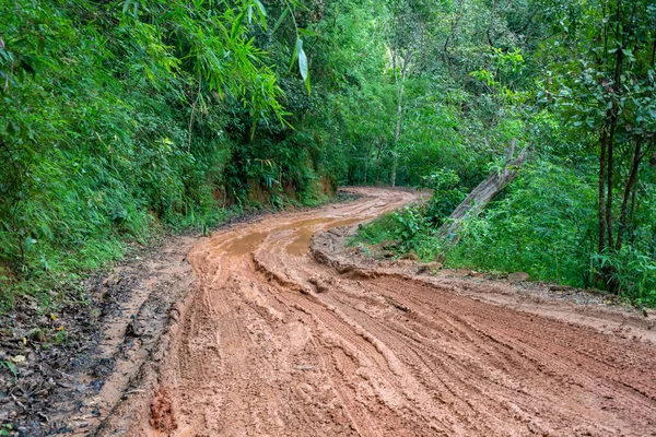Road wet muddy of backcountry countryside in rainy day — Stock Photo, Image