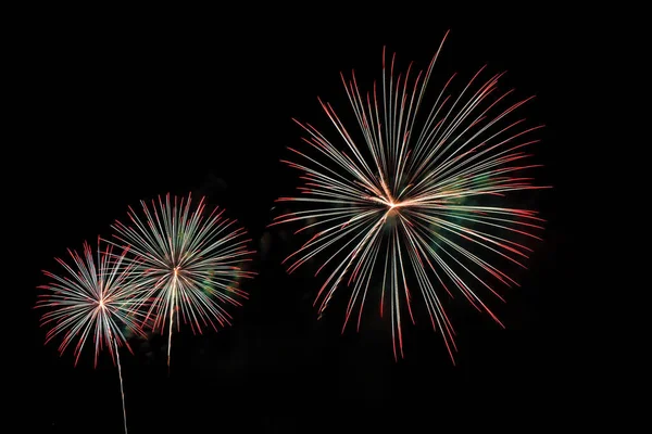 Colorful fireworks of various colors at night with celebration a — Stock Photo, Image