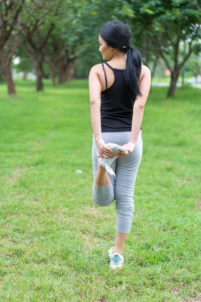 Young Female Warm Exercise Park Royalty Free Stock Images