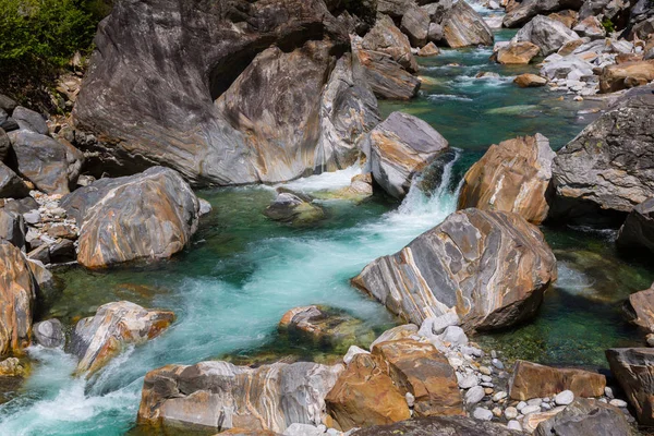 colorful stones and water of Verzasca river in Ticino Switzerlan