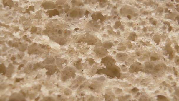 Superficie de pan tostado, textura de fondo de pan — Vídeos de Stock