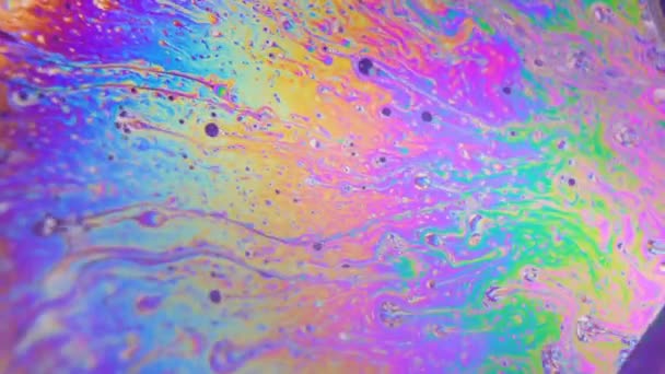 Macro Abstract Colorful Bubbles With Rainbow Colored Liquid background — Stock Video