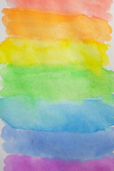multi colored horizontal stripes painted with rainbow watercolor. copy spaces