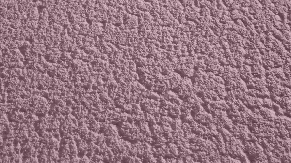 Pembe dokular. Duvarda desenli alçı