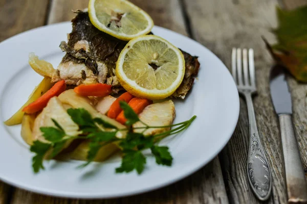 fish and vegetables in oven