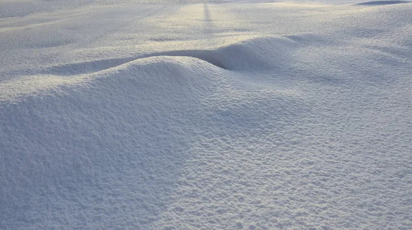 Abstract winter achtergrond - textuur van pure sneeuw oppervlak met s — Stockfoto