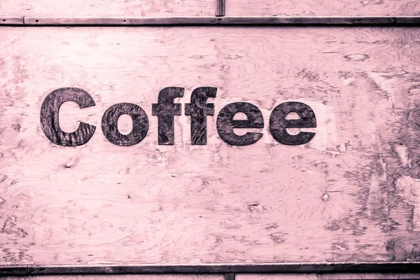 Coffee lettering on wood background — Stock Photo, Image