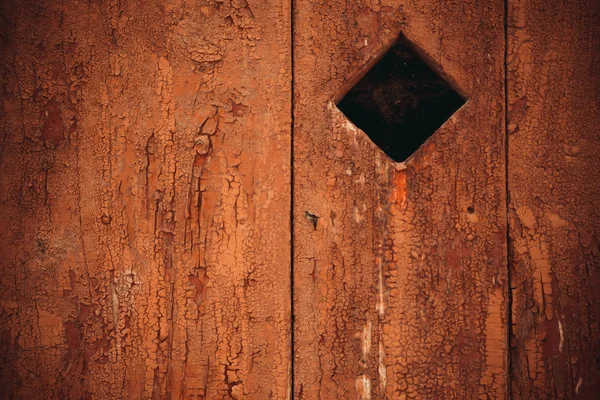 Peeling paint on a wooden board, background texture — Stock Photo, Image