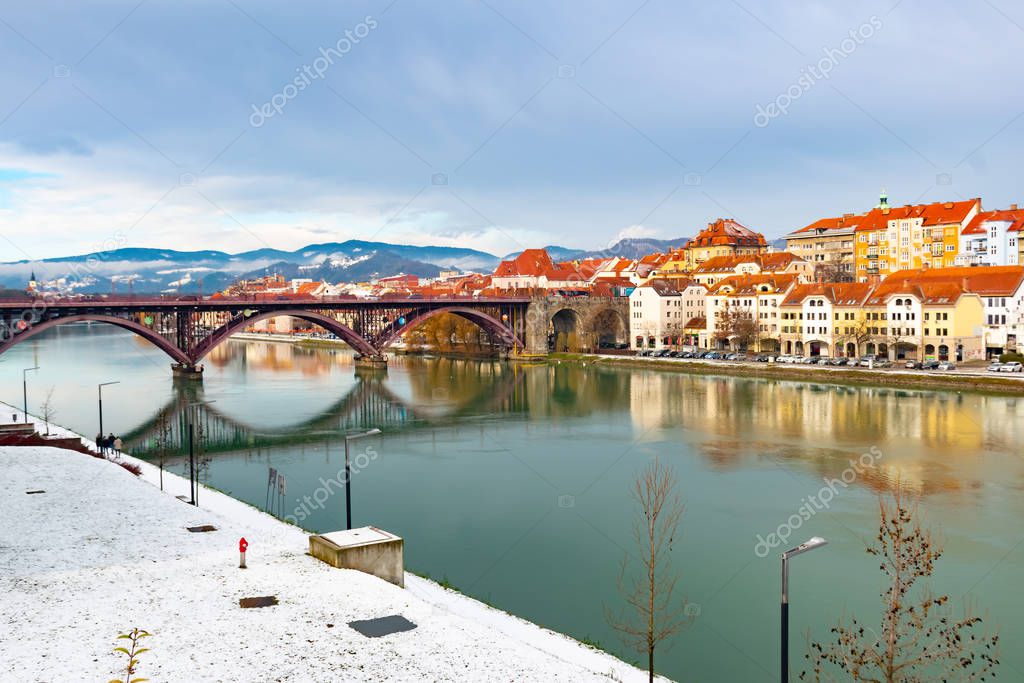 Amazing view of Maribor Old city, medieval water tower on the Drava river at morning, Slovenia