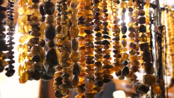Amber close up.Womens beads. Womens necklaces. Womens jewelry — Stock Video