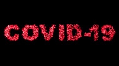 Covid-19. Coronavirus. Animasyon etkisi olan yazıtın konsepti virüsün birçok kırmızı ve beyaz salgını şeklinde. Siyah arka planda kırmızı kelime.