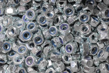 Kaçık. Doku. Cıvata ve vida için bir sürü lastik fındık. Duvar kağıdı için arka plan. Kadın düzüşmesi. Çatlak herif. İç vida.