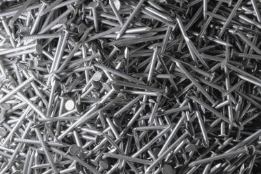 Metal Çiviler. Doku. Bir sürü yeni demir çivi. Duvar kağıdı için arkaplan.