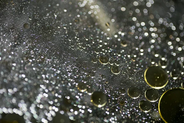 Su makro zemin üzerinde yağ kabarcıkları 50 megapiksel yüksek kalite