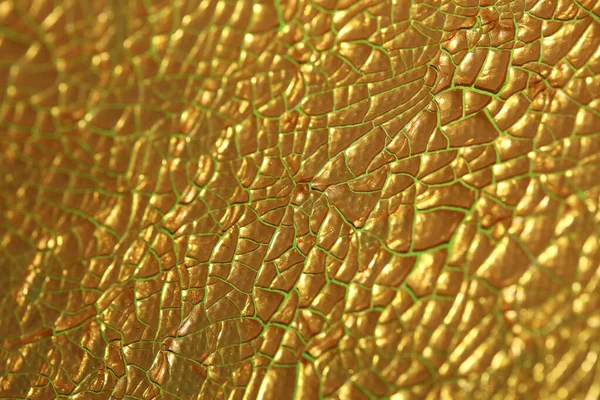 Cracked golden paint on canvas macro background high quality fif — Stok Foto