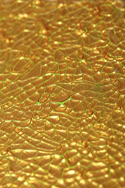 Rissige goldene Farbe auf Leinwand Makrohintergrund hoher Qualität fif — Stockfoto