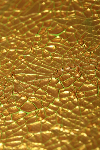 Cracked golden paint on canvas macro background high quality fif — Stok Foto