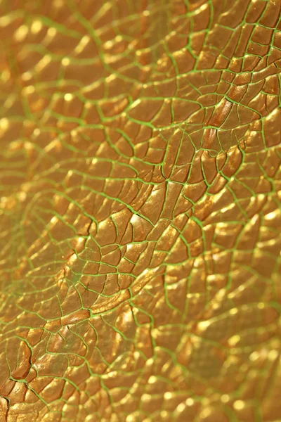 Gebarsten gouden verf op doek macro achtergrond van hoge kwaliteit fif — Stockfoto