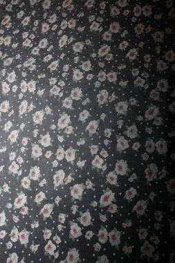 Old vintage textile with small flower macro background high qual