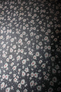 Old vintage textile with small flower macro background high qual