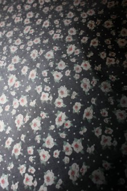 Old vintage textile with small flower macro background high qual