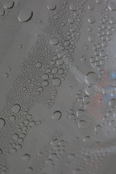 Krople Wody Plastikowej Butelce Makro Tło Wysokiej Jakości Wydruki — Zdjęcie stockowe