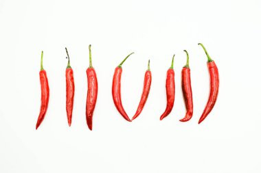 Kırmızı Chili veya biber veya Capsicums, izole edilmiş beyaz arka planda çekimler.