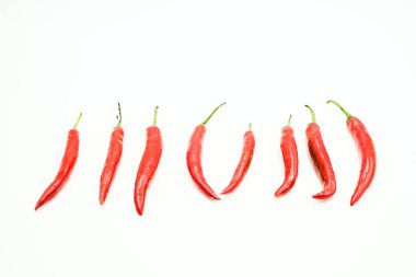 Kırmızı Chili veya biber veya Capsicums, izole edilmiş beyaz arka planda çekimler.