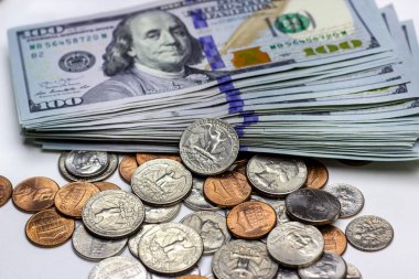 American coins on dollar usa background. Financial concept.