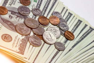 American coins on dollar usa background. Financial concept.