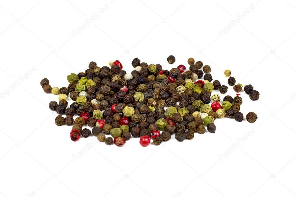 Black, red and white peppercorns, pepper mix isolated on white background.