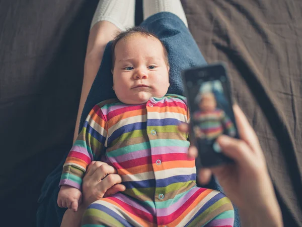 Mother taking photo of her baby — Stock Photo, Image