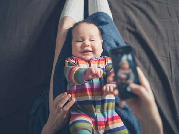 Mother taking photo of her baby — Stock Photo, Image