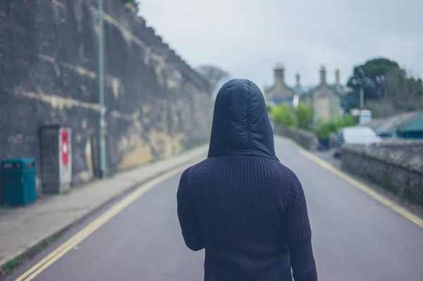 Rear view of woman in village — Stock Photo, Image