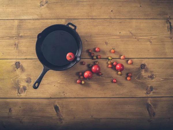 Over view of frying pan with tomatoes — Stock Photo, Image