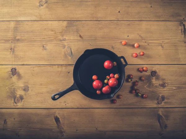 Over view of tomatoes in frying pan — Stock Photo, Image